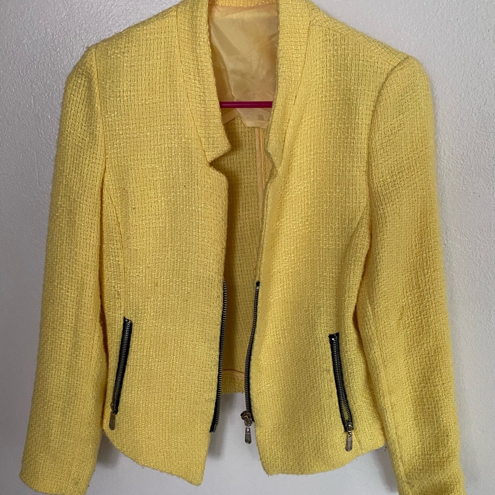 Modern yellow blazer with black zippers